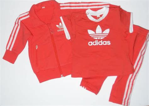 fake adidas track suit|adidas tracksuit unisex.